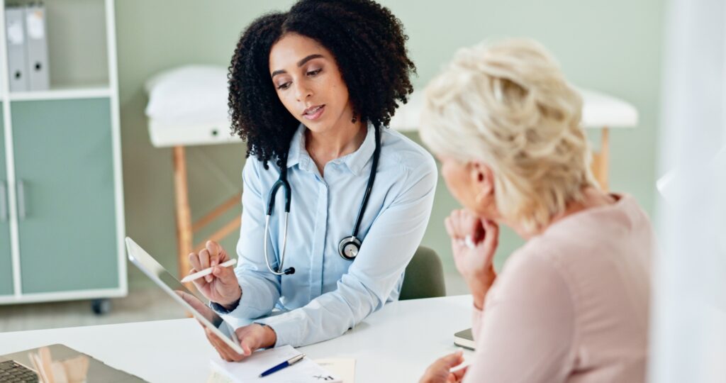 doctor talking to patient