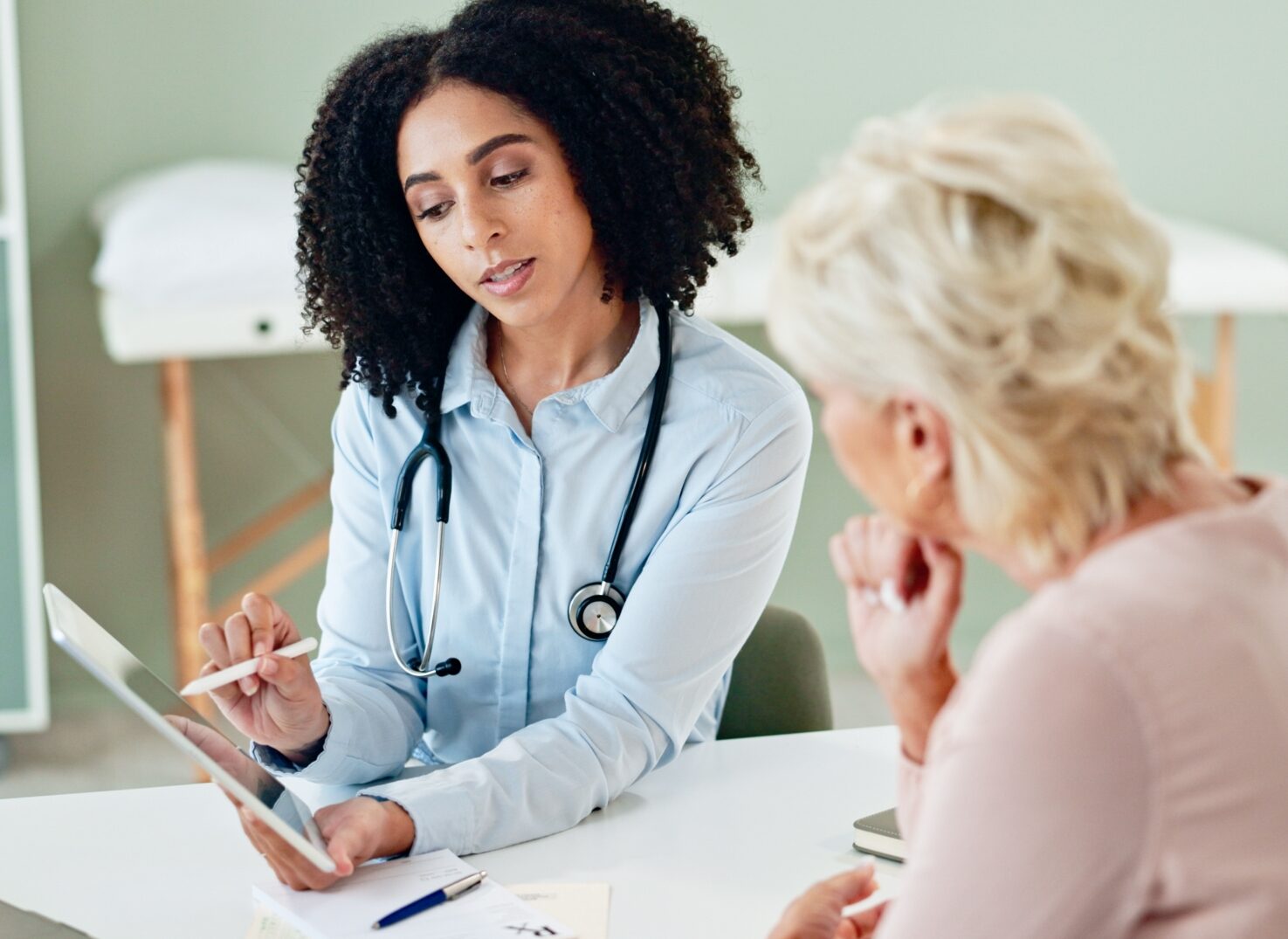 doctor talking to patient