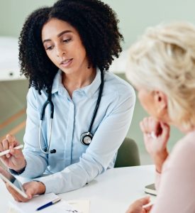 doctor talking to patient